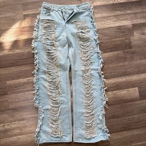 Distressed Light Blue Flare Jeans